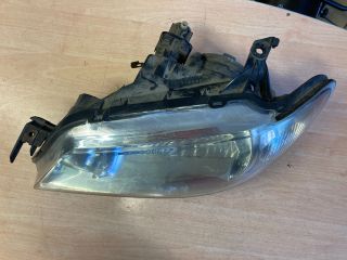 bontott MAZDA 323 Bal Fényszóró