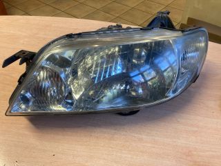 bontott MAZDA 323 Bal Fényszóró