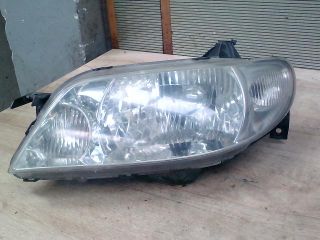 bontott MAZDA 323 Bal Fényszóró