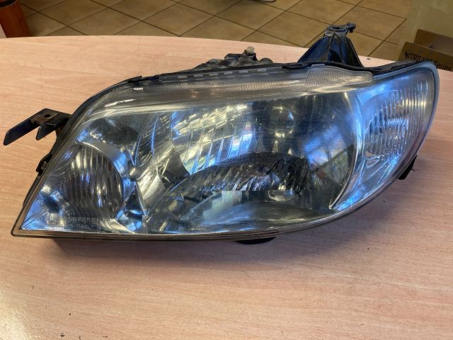 bontott MAZDA 323 Bal Fényszóró