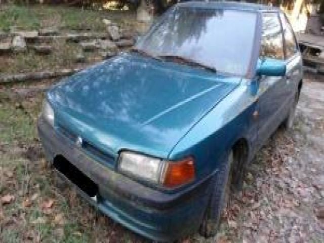 bontott MAZDA 323 Bal hátsó Ablak