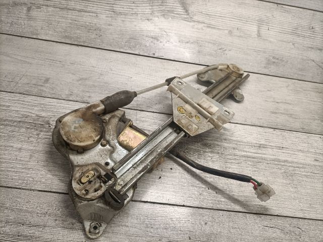 bontott MAZDA 323 Bal hátsó Ablakemelő Szerkezet (Elektromos)