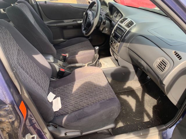 bontott MAZDA 323 Bal hátsó Ajtó (Részeivel)