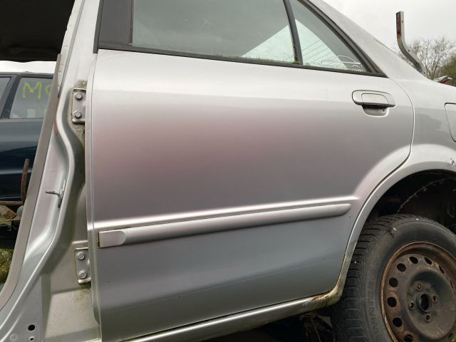 bontott MAZDA 323 Bal hátsó Ajtó (Üres lemez)