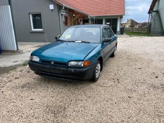 bontott MAZDA 323 Bal hátsó Ajtó (Üres lemez)