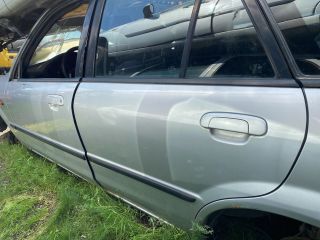 bontott MAZDA 323 Bal hátsó Ajtó (Üres lemez)