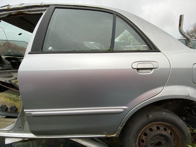 bontott MAZDA 323 Bal hátsó Ajtó (Üres lemez)