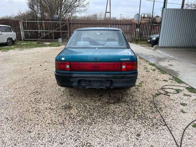 bontott MAZDA 323 Bal hátsó Ajtó (Üres lemez)