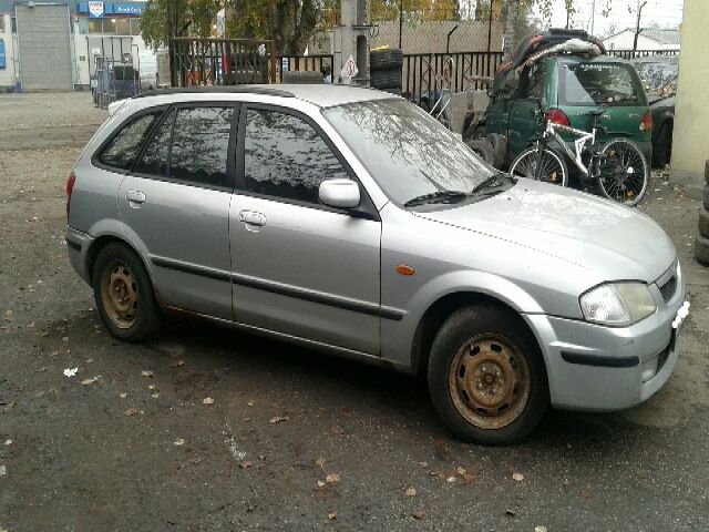 bontott MAZDA 323 Bal hátsó Ajtóhatároló