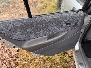 bontott MAZDA 323 Bal Napellenző