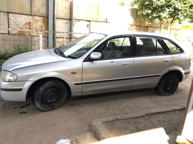 bontott MAZDA 323 Csomagtérajtó Díszléc