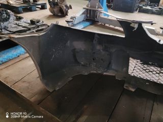 bontott MAZDA 323 Első Lökhárító (Részeivel)