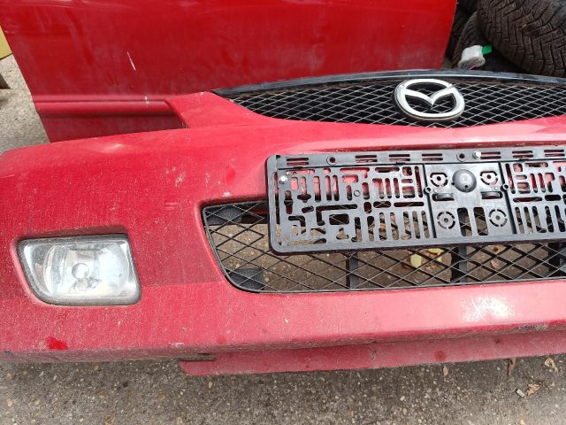 bontott MAZDA 323 Első Lökhárító (Részeivel)