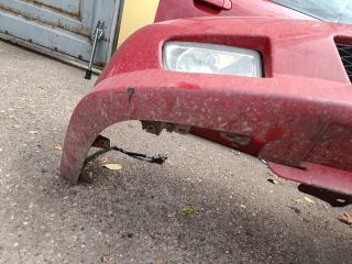 bontott MAZDA 323 Első Lökhárító (Részeivel)