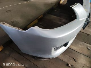 bontott MAZDA 323 Első Lökhárító (Részeivel)