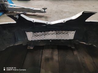 bontott MAZDA 323 Első Lökhárító (Részeivel)