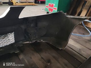 bontott MAZDA 323 Első Lökhárító (Részeivel)