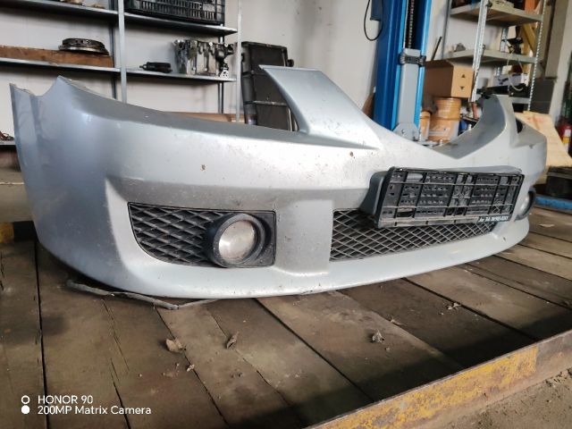 bontott MAZDA 323 Első Lökhárító (Részeivel)