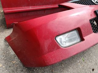 bontott MAZDA 323 Első Lökhárító (Részeivel)