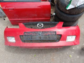 bontott MAZDA 323 Első Lökhárító (Részeivel)