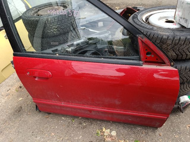 bontott MAZDA 323 Jobb első Ajtó (Részeivel)