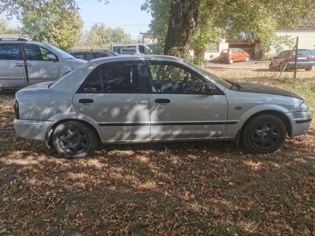 bontott MAZDA 323 Jobb első Ajtó (Részeivel)