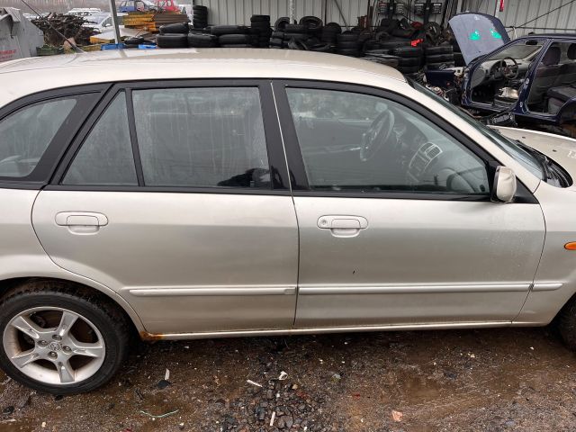 bontott MAZDA 323 Jobb hátsó Ablakemelő Szerkezet (Elektromos)