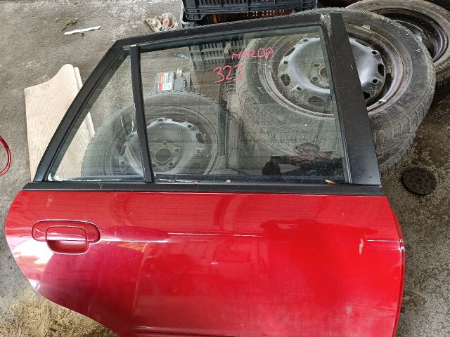 bontott MAZDA 323 Jobb hátsó Ajtó (Részeivel)