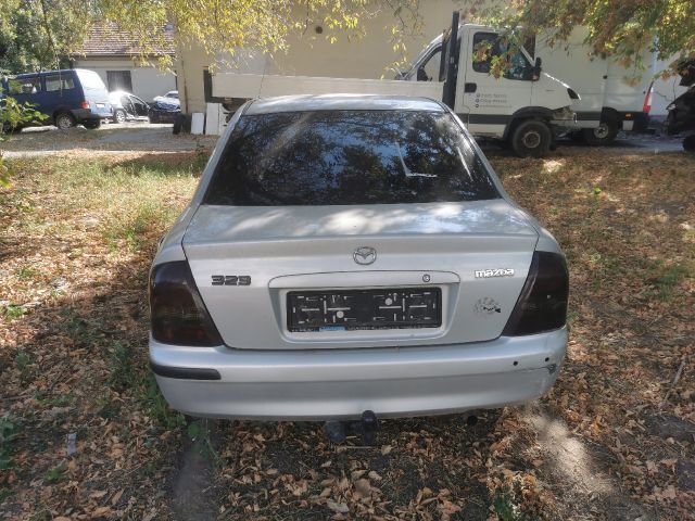 bontott MAZDA 323 Jobb hátsó Ajtó (Részeivel)