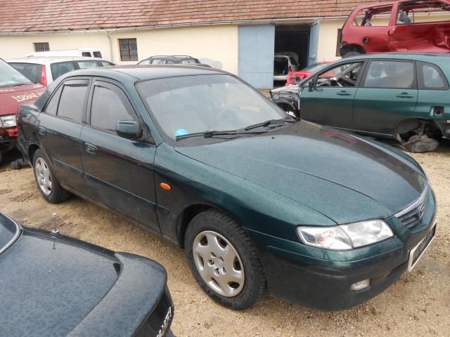 bontott MAZDA 626 Bal hátsó Rugó