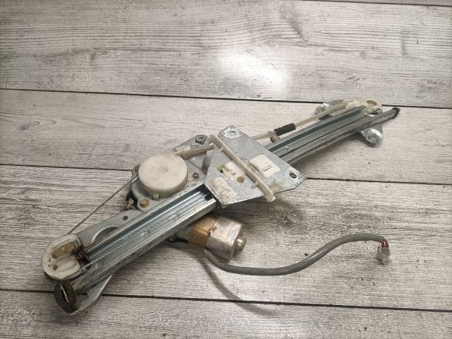 bontott MAZDA 626 Bal hátsó Ablakemelő Szerkezet (Elektromos)