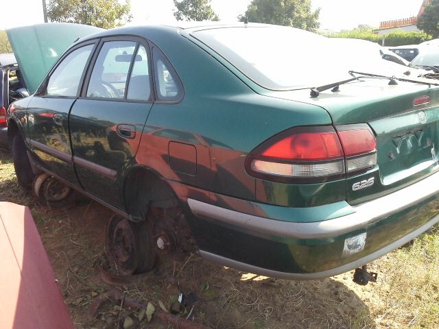 bontott MAZDA 626 Bal hátsó Ajtó (Üres lemez)