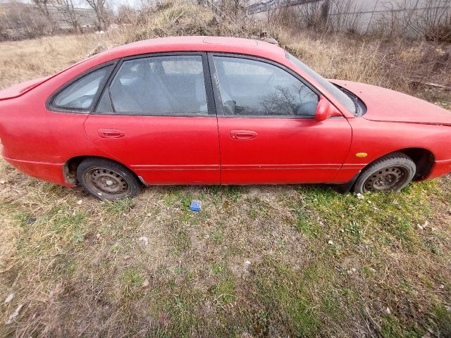 bontott MAZDA 626 Jobb első Dobbetét (Kerékjárati, Műanyag)