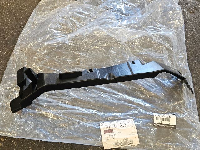 bontott MAZDA CX-30 Bal Fényszóró Tartó