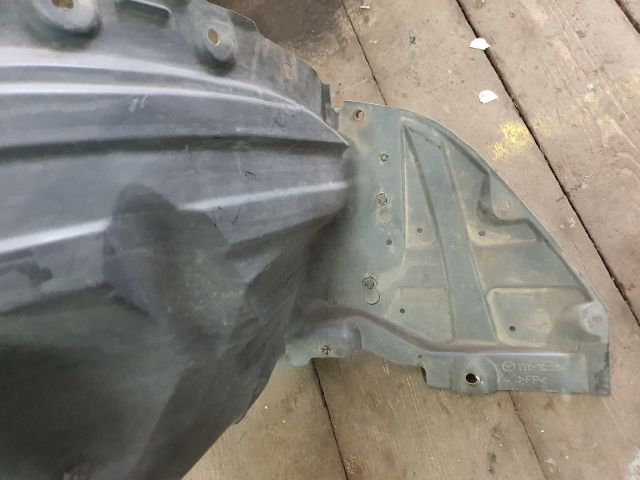 bontott MAZDA CX-5 Bal első Első Dobbetét (Kerékjárati, Műanyag)