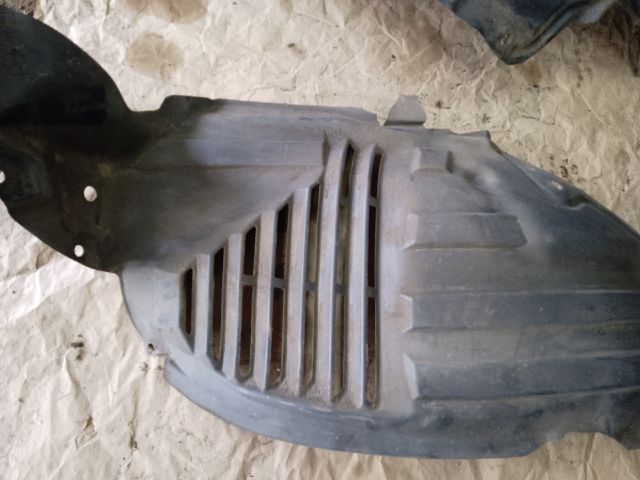 bontott MAZDA CX-7 Bal első Dobbetét (Kerékjárati, Műanyag)