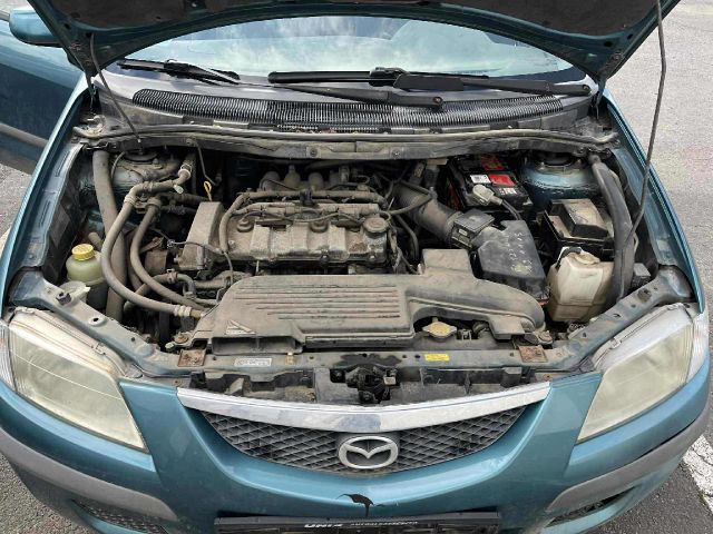 bontott MAZDA PREMACY Bal első Dobbetét (Kerékjárati, Műanyag)