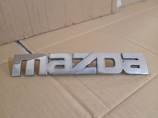 bontott MAZDA PREMACY Hátsó Embléma