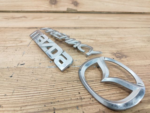 bontott MAZDA PREMACY Hátsó Embléma