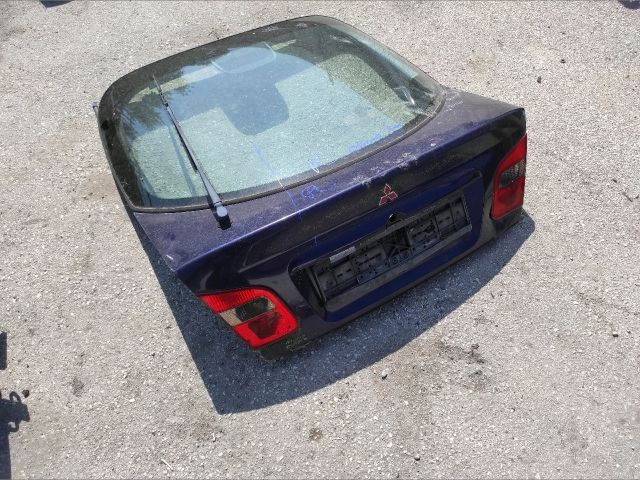 bontott MITSUBISHI CARISMA Csomagtérajtó (Részeivel)