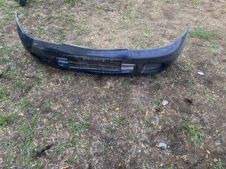 bontott MITSUBISHI CARISMA Első Lökhárító (Részeivel)