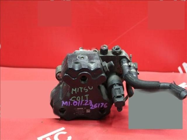 bontott MITSUBISHI COLT Adagoló