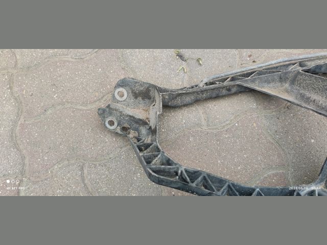 bontott MITSUBISHI COLT Bal Fényszóró Tartó