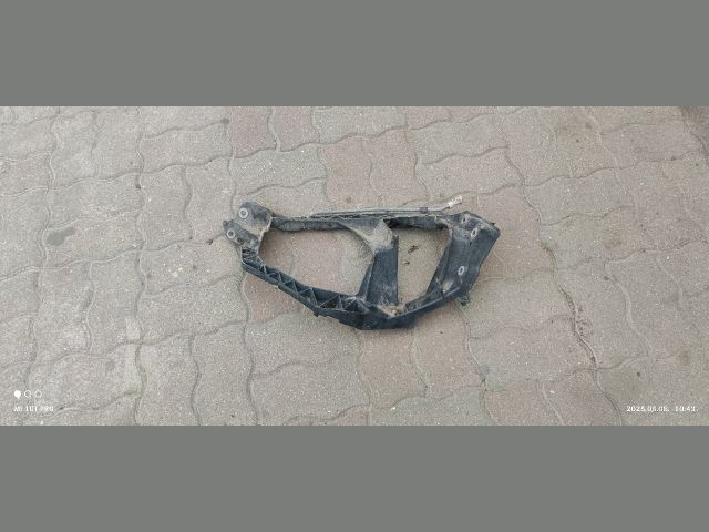 bontott MITSUBISHI COLT Bal Fényszóró Tartó