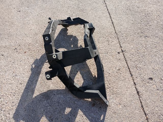 bontott MITSUBISHI COLT Bal Fényszóró Tartó