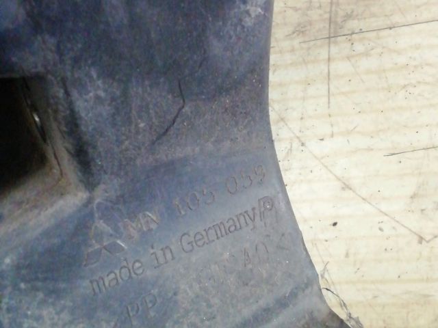 bontott MITSUBISHI COLT Bal Fényszóró Tartó