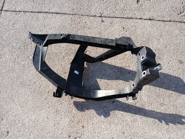 bontott MITSUBISHI COLT Bal Fényszóró Tartó