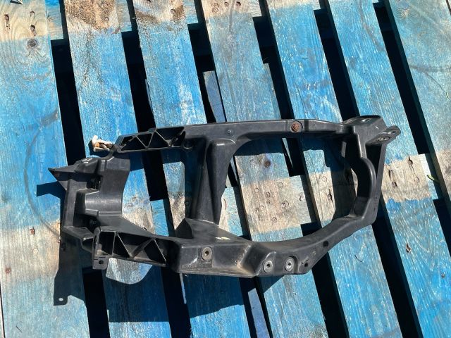 bontott MITSUBISHI COLT Bal Fényszóró Tartó