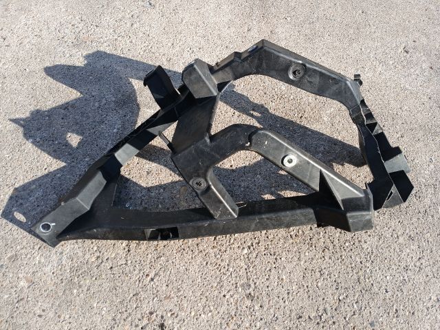 bontott MITSUBISHI COLT Bal Fényszóró Tartó