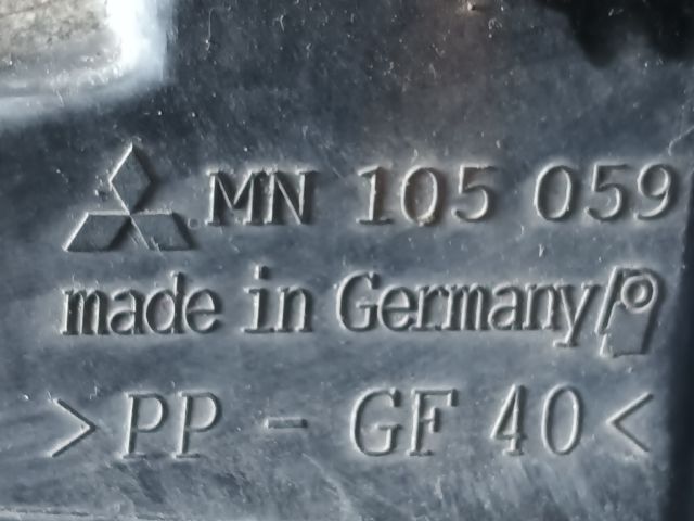 bontott MITSUBISHI COLT Bal Fényszóró Tartó